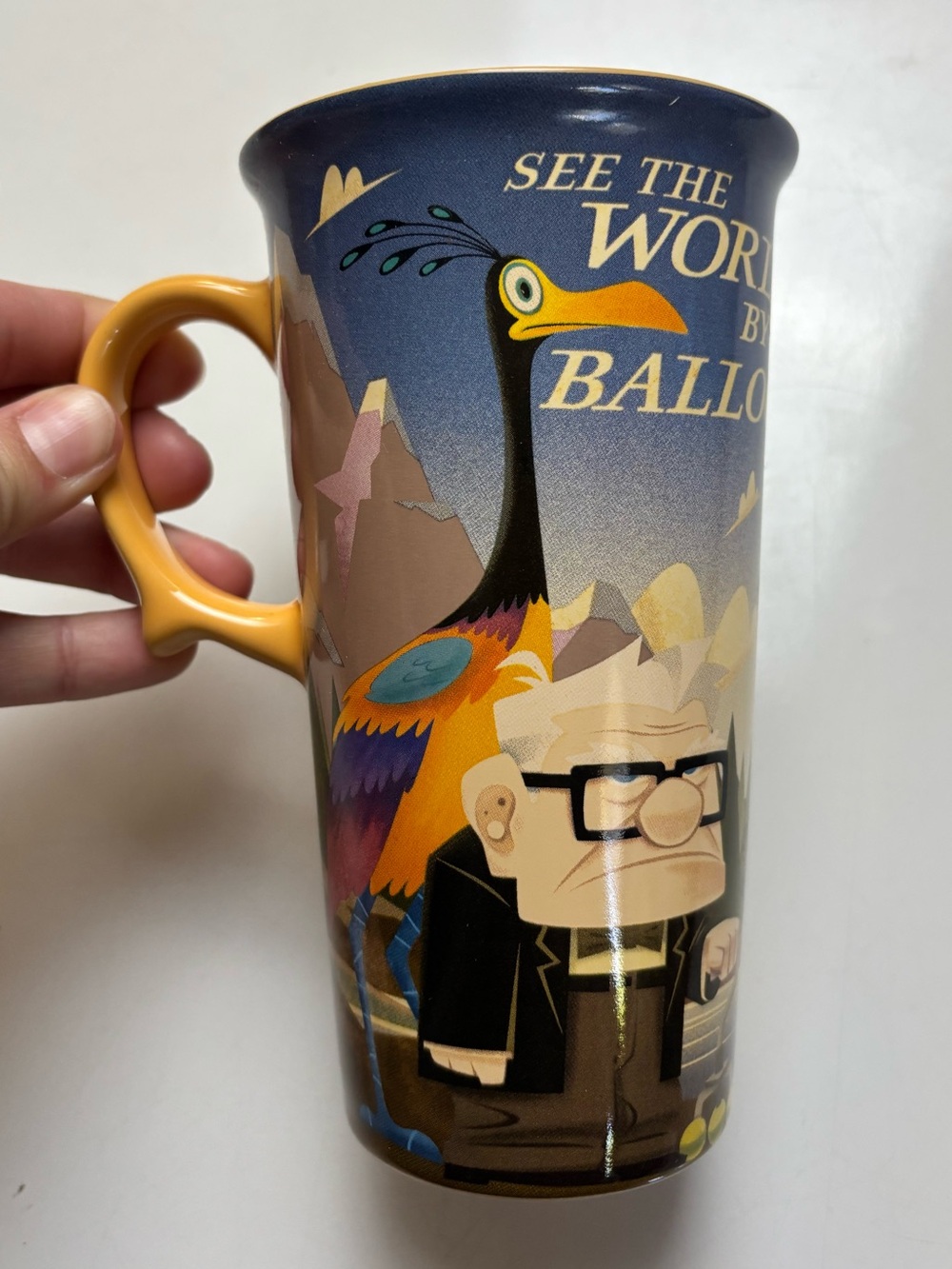 Disney / Pixar Up Ceramic Yellow Travel Mug See the World by Balloon